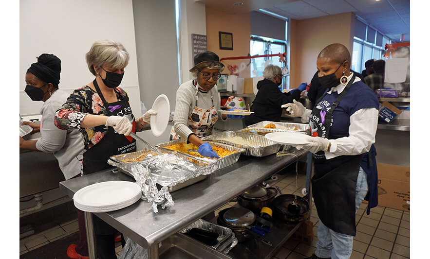 Better Life Homeless Memorial Day 12-21-2022 Prepping food for web