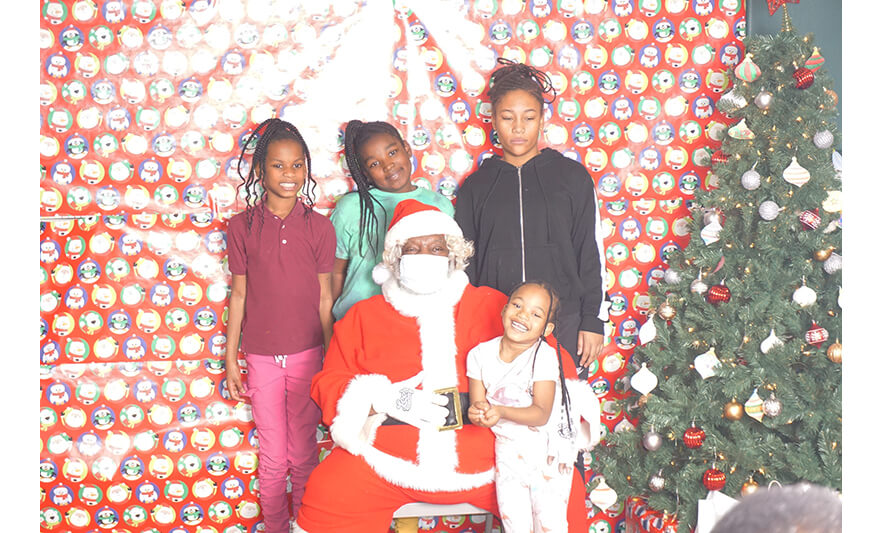 Breakfast with Santa 12-17-2022 Four girls with Santa for web