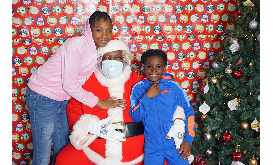 Breakfast with Santa 12-17-2022 Girl and boy with Santa for web
