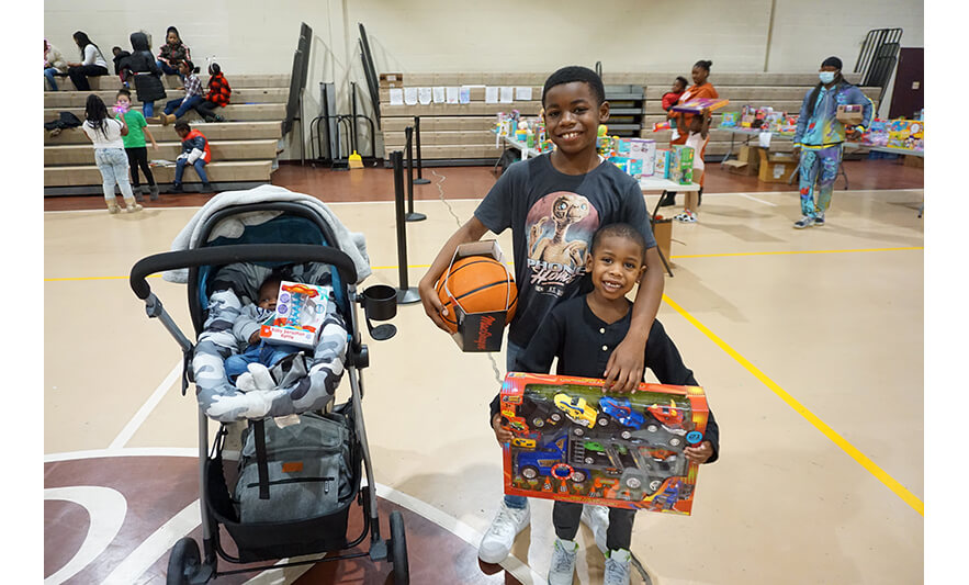 Breakfast with Santa 12-17-2022 Two boys and baby with gifts for web