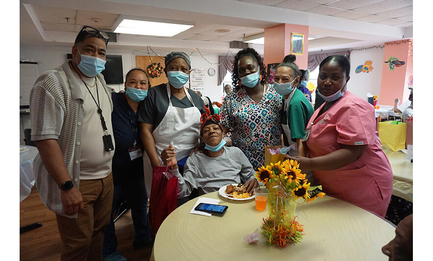 Extended Care Adopt-a-Resident Day 5-15-2025 Group with woman for web