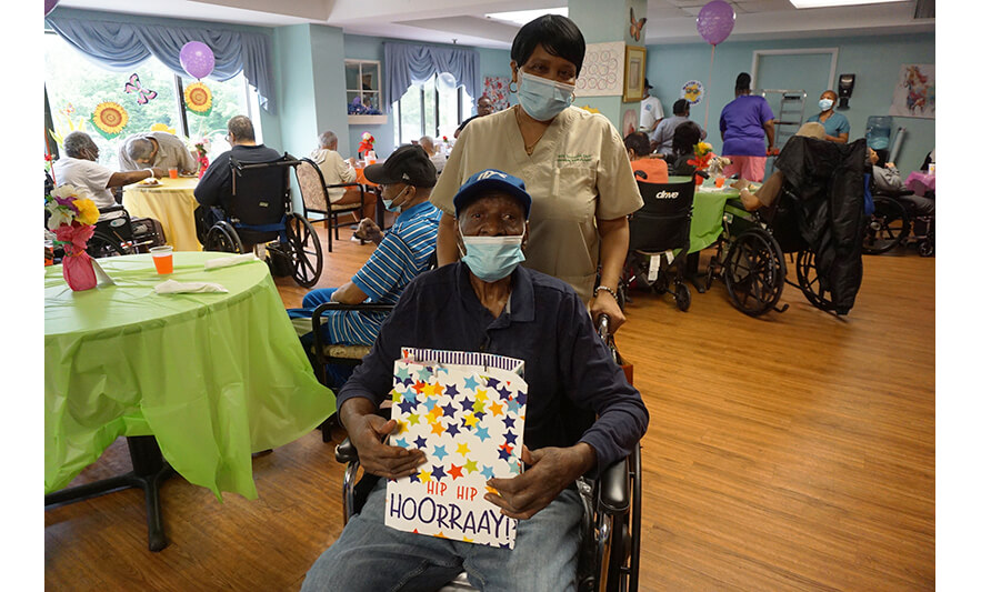 Extended Care Adopt-a-Resident Day 5-15-2025 Man in blue hat for web