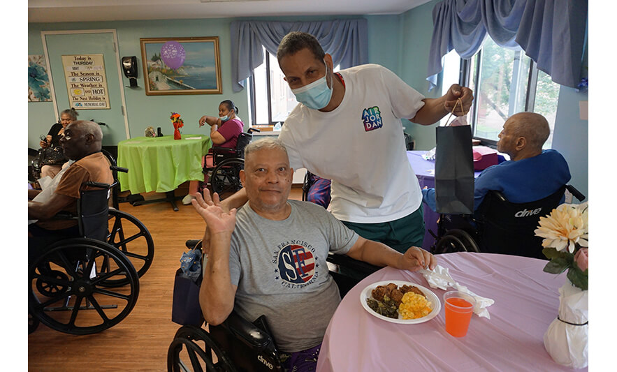 Extended Care Adopt-a-Resident Day 5-15-2025 Man waving for web