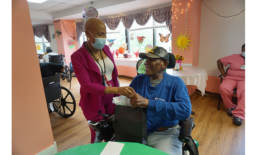Extended Care Adopt-a-Resident Day 5-15-2025 Veronica Onwunaka with veteran for web