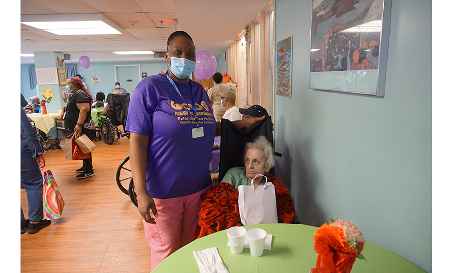 Extended Care Adopt-a-Resident Day 5-15-2025 Woman in blanket for web