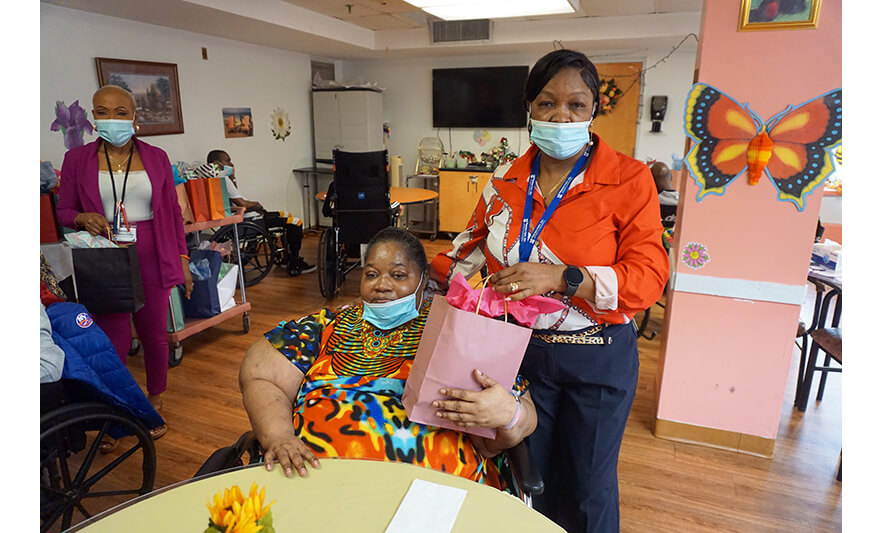Extended Care Adopt-a-Resident Day 5-15-2025 Yonette Semple with woman in orange for web