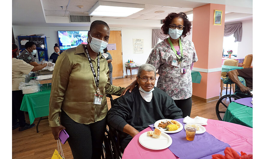 Extended Care Adopt-A-Resident Day 5-17-2023 Julienne Van-Nooten and Maria Cruz with man for web