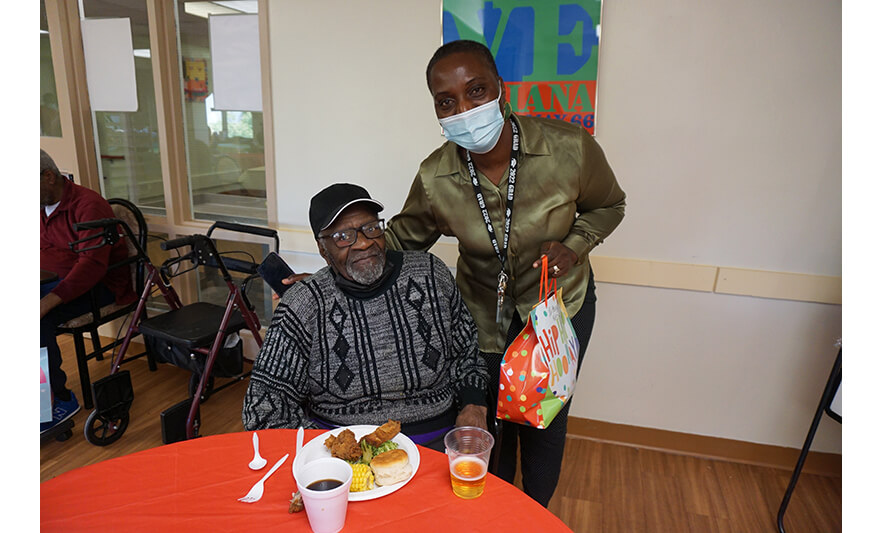 Extended Care Adopt-A-Resident Day 5-17-2023 Julienne Van-Nooten with man in black for web