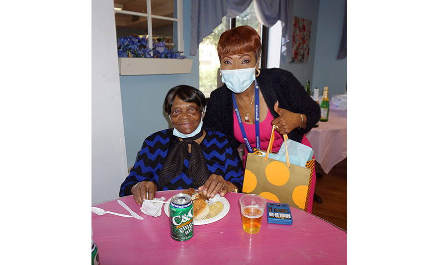 Extended Care Adopt-A-Resident Day 5-17-2023 Veronica Onwunaka with woman in blue for web