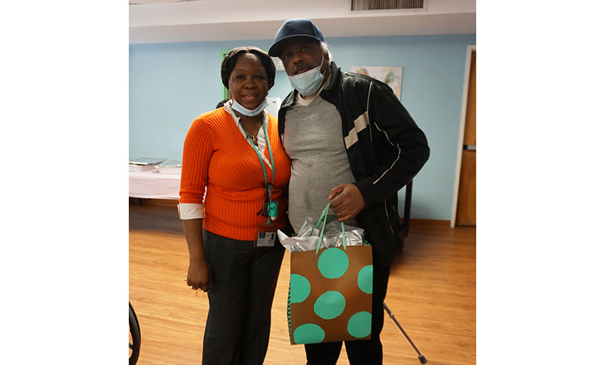 Extended Care Adopt-A-Resident Day 5-17-2023 Yonette Semple standing with man for web