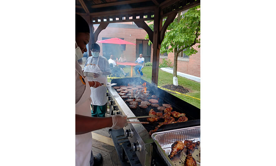 Extended Care Cookout 5-19-2023 Cooking for web