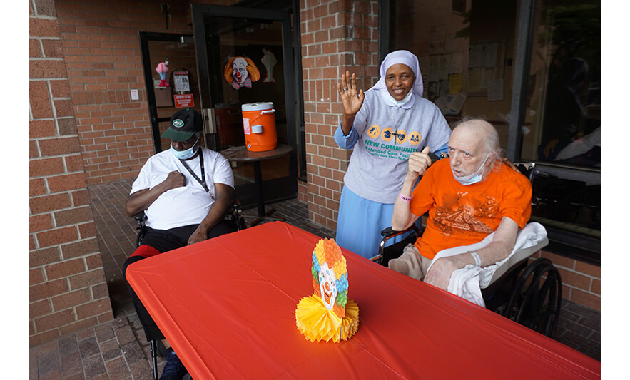 Extended Care Cookout 5-19-2023 Sister Elizabeth Lima with residents for web
