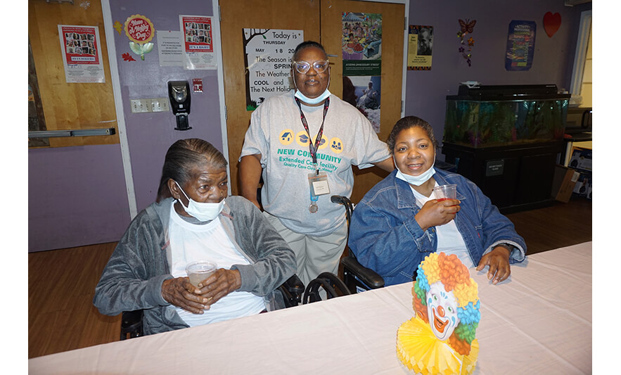 Extended Care Cookout 5-19-2023 Two women with staff member for web