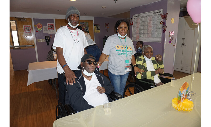 Extended Care Cookout 5-19-2023 Yonette Semple with residents for web