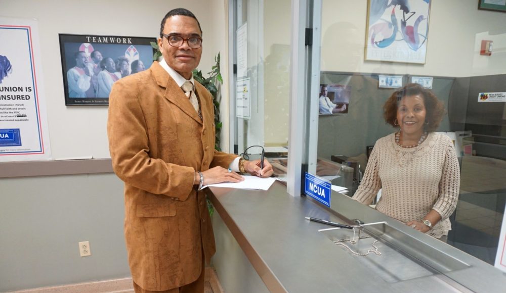 Miles Callender and Mulu Gebreyesus at Credit Union