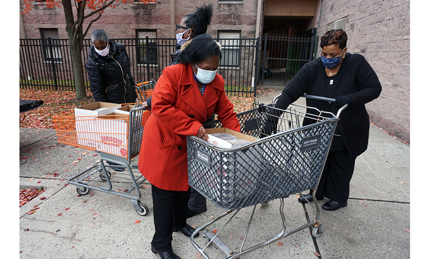 Withum Harmony House Thanksgiving 11-22-2021 Elizabeth Mbakaya loading shopping cart for web