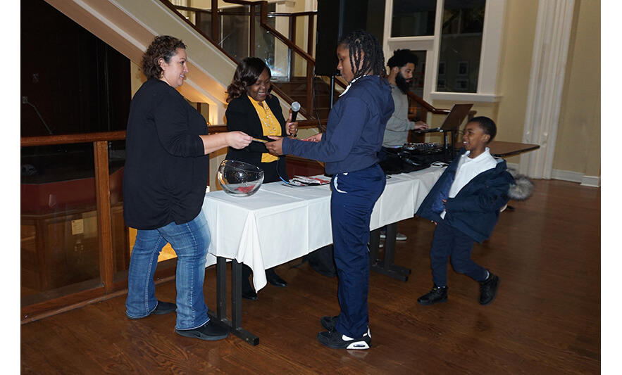 Withum Harmony House Thanksgiving Dinner 11-21-2022 Older girl getting gift card for web